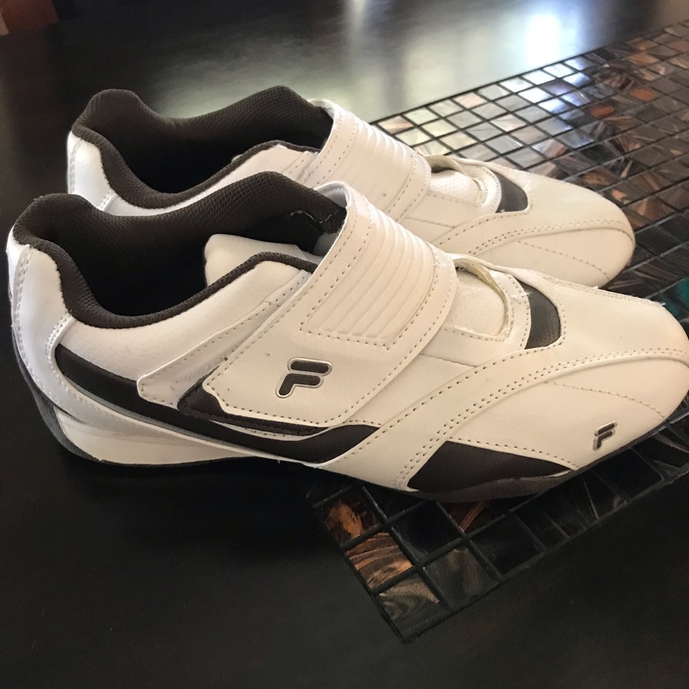Fila White sneakers.